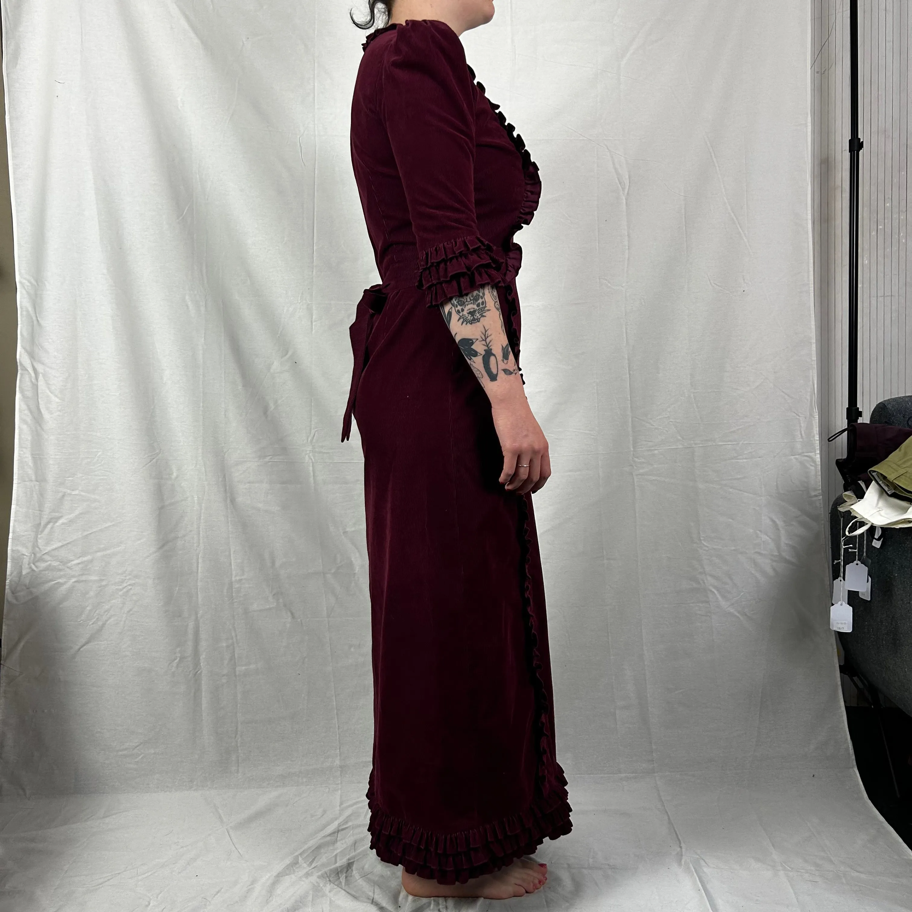 Here’s an optimized title for the e-commerce product:

The Vampires Wife Burgundy Needlecord Maxi Dress - Size Small, Elegant Vintage Style